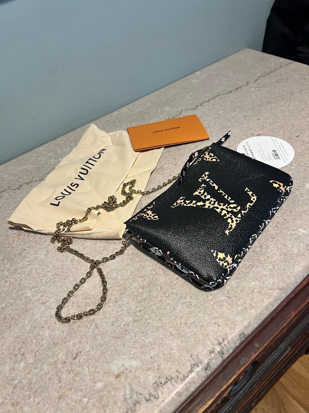 LOUIS VUITTON
Double Zip Jungle Pochette Giant Monogram Leather Crossbody Bag - Picture 2 of 15
